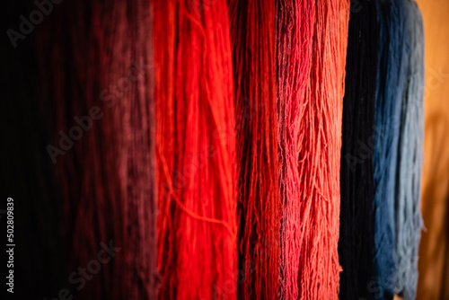 Colorful wool threads to weave rugs by Oaxaca artisans.