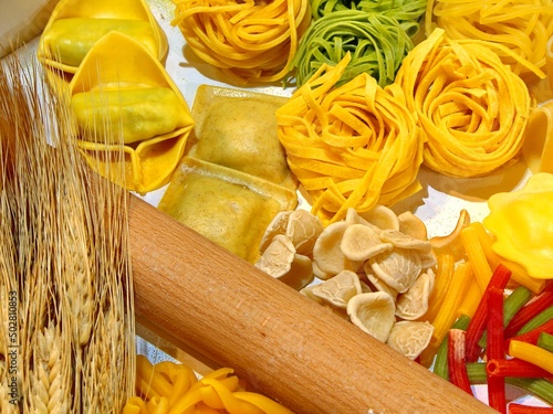Italian pasta with various sizes and wheat spikes