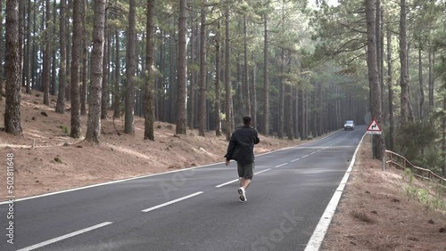 Wallpaper Mural A guy and a girl run around fooling around and making videos on a beautiful road to the Teide volcano Torontodigital.ca