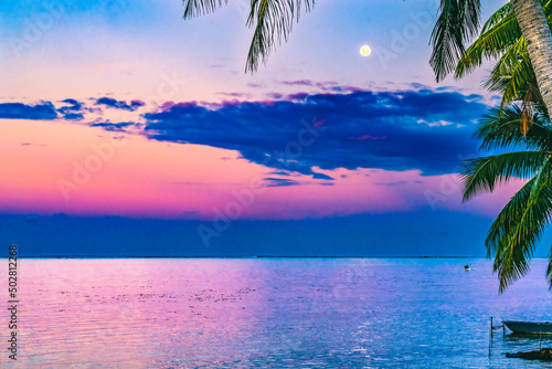 Fototapeta Naklejka Na Ścianę i Meble -  Moon Sunset Reflection Blue Water Moorea Tahiti