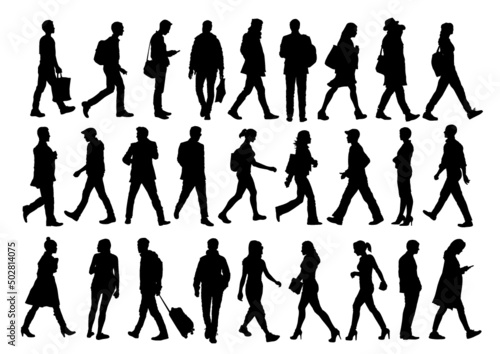 silhouettes of walking people photo