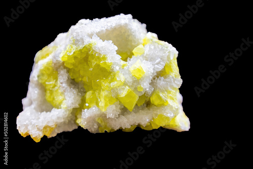 Tableau sur toile Calcite sulfur crystal mineral isolated on black background
