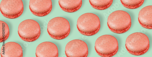 Bright macaroons on a colored background