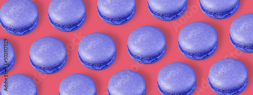 Bright macaroons on a colored background