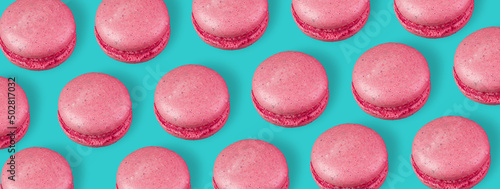Bright macaroons on a colored background