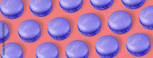 Bright macaroons on a colored background
