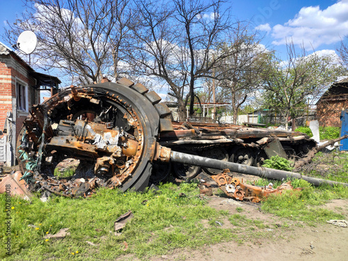 The wreckage of a burnt Russian tank in the war with Ukraine. War in Ukraine