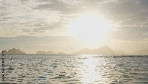 Glowing Sunset Over Sea By Corong Corong Beach photo