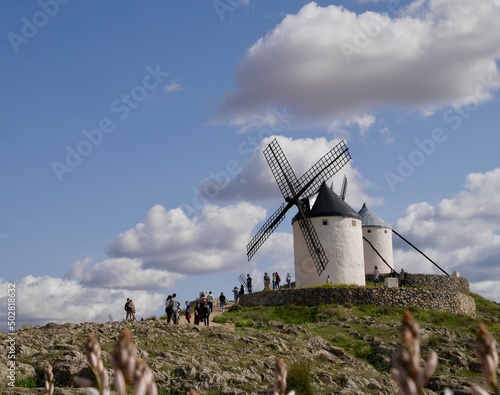 Tourists visiting famous windmills in Consuegra, Castile La Mancha, Spain, 13.04.2022.