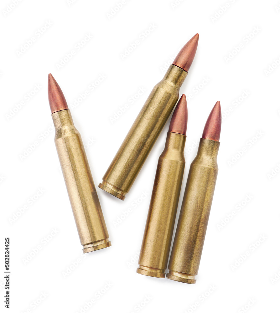 Many bullets on white background, top view. Military ammunition Many bullets on white background, top view. Military ammunition