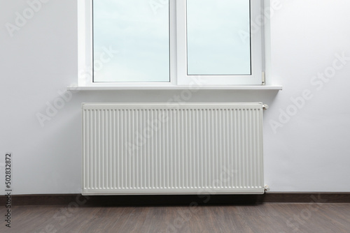 Modern radiator at home. Central heating system