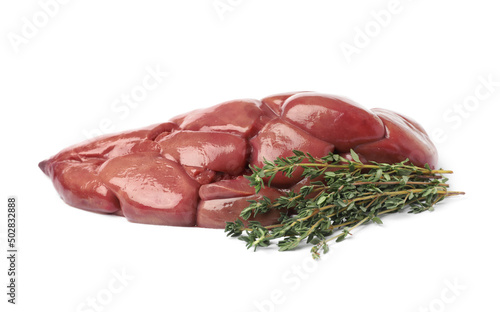 Fresh raw kidney meat with thyme isolated on white photo