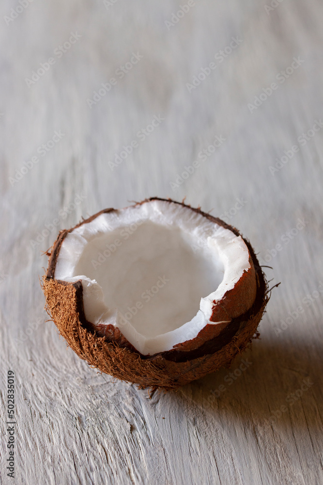 Fresh Cut Coconut on Simple Background with Copy Space Fresh Cut Coconut on Simple Background with Copy Space