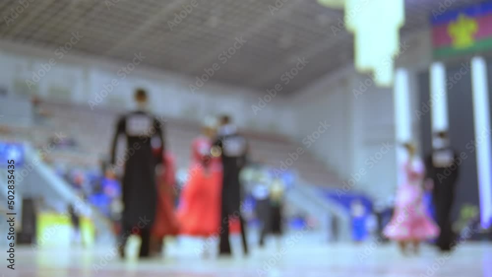 blurred background. ballroom dancing championship, standard program. blurred background. ballroom dancing championship, standard program.
