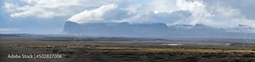 Iceland autumn tundra landscape near Haoldukvisl glacier, Iceland. Glacier tongue slides from the Vatnajokull icecap or Vatna Glacier near subglacial Esjufjoll volcano. Not far from Iceland Ring Road.