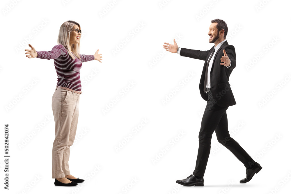 Full length profile shot of a businessman walking towards a young woman with arms wide open