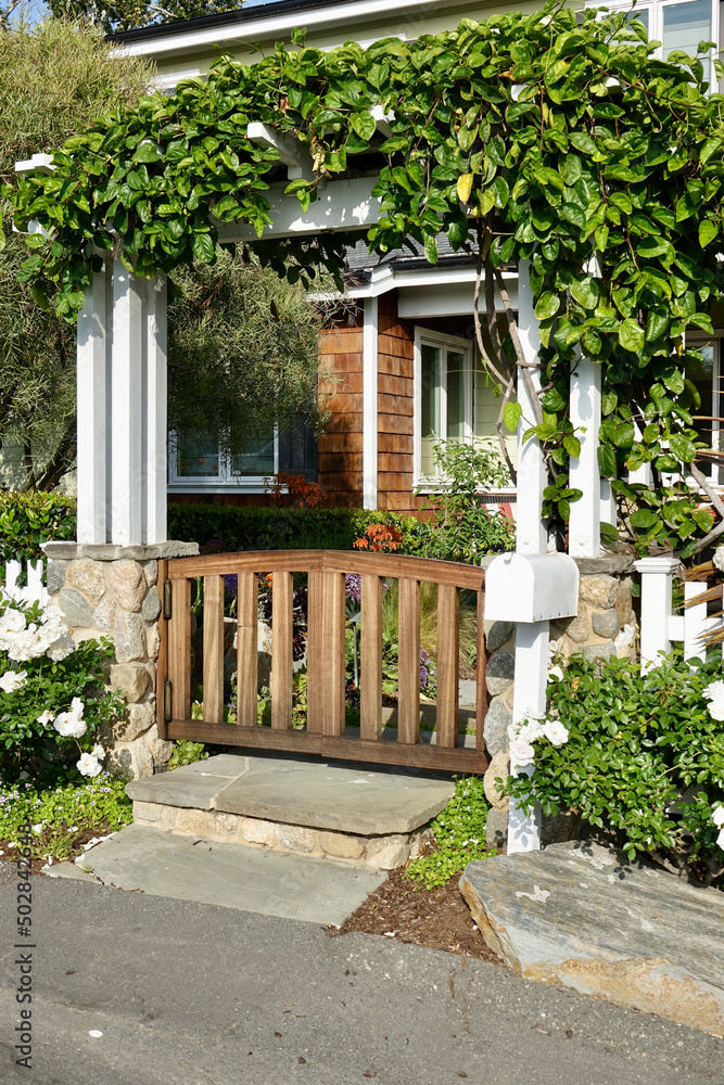 beach house with gated pergola entryway to the garden beach house with gated pergola entryway to the garden