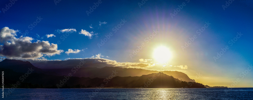 Panorama of coast, mountains, ocean, sun, hills, Hawaii
