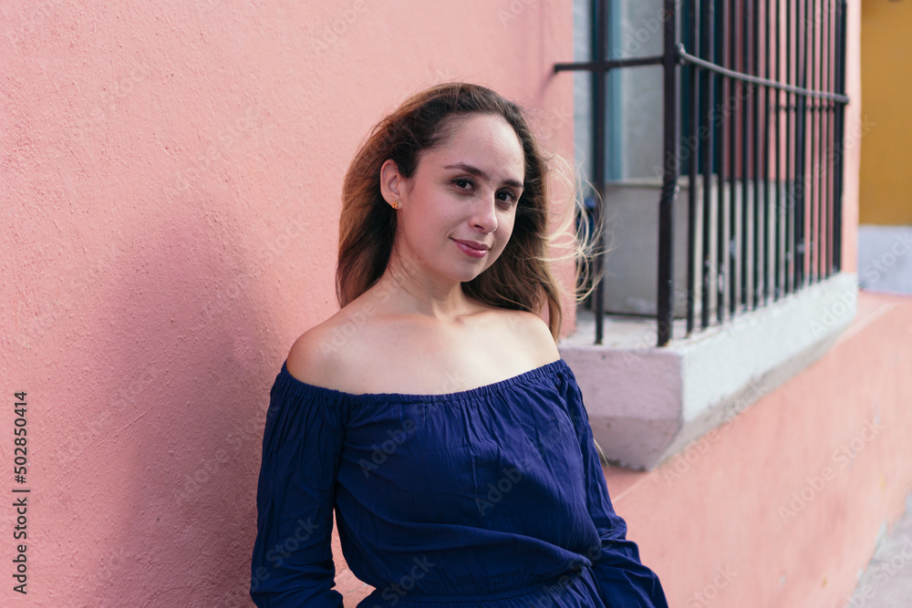 Shot of a modern young woman outdoors. Shot of a modern young woman outdoors.
