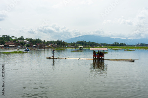 Wallpaper Mural Tourists using raft enjoying Beautiful View of Bagendit Lake in Garut, West Java, Indonesia. Lake Bagendit is a popular tourist destination in Garut Regency. Torontodigital.ca