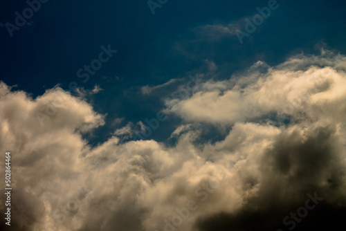 Fototapeta Naklejka Na Ścianę i Meble -  yellow and brown clouds. blue sky with clouds.
