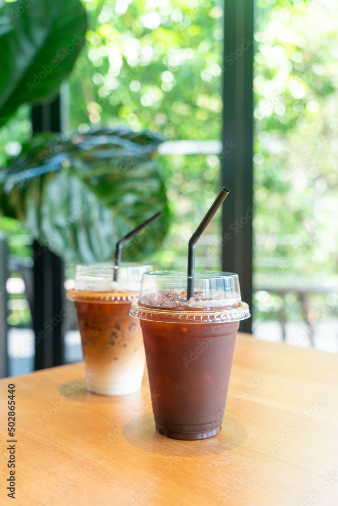 iced black coffee takeaway glass on table in coffee shop cafe restaurant iced black coffee takeaway glass on table in coffee shop cafe restaurant