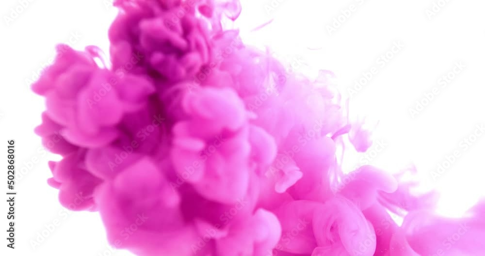 Colored abstract explosion effect. Paint pink color swirls in water. Color liquid in water movement. Acrylic or watercolor paint.