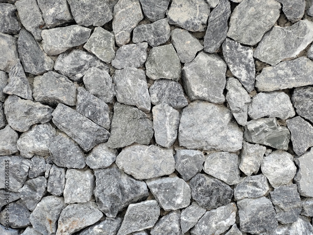 Texture of a stone wall. Old castle stone wall texture background. Stone wall as a background or texture. Part of a stone wall, for background or texture. Texture of a stone wall. Old castle stone wall texture background. Stone wall as a background or texture. Part of a stone wall, for background or texture.