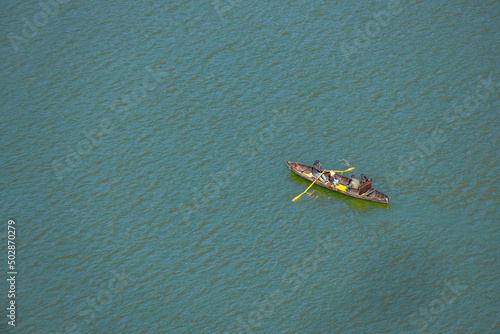 Selective focus Ariel view of people boating at Naini Lake in Nainital Uttarakhand India on 2 January 2022