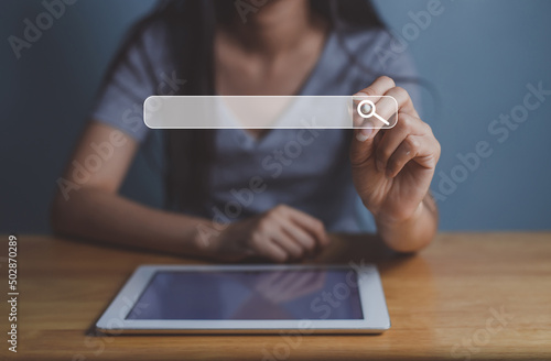 Businesswoman using phone searching Browsing Internet Data Information.Networking Concept photo
