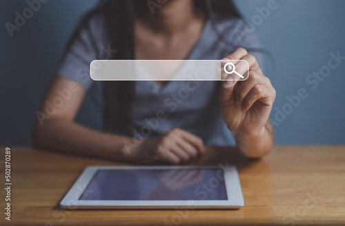 Businesswoman using phone searching Browsing Internet Data Information.Networking Concept