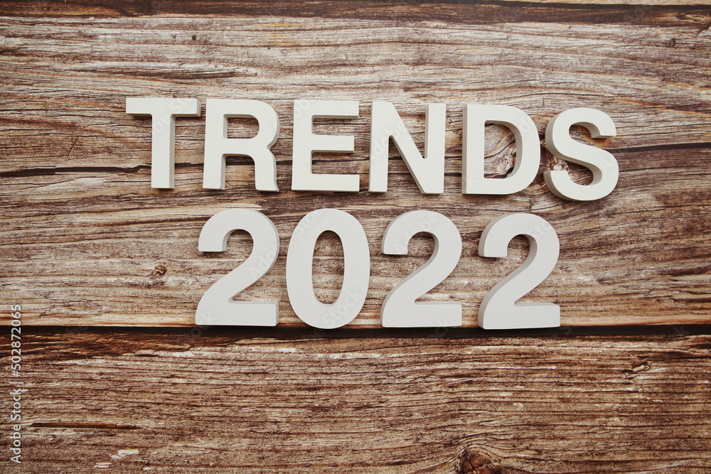 Trends 2022 alphabet letters on wooden background Trends 2022 alphabet letters on wooden background