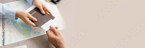 Travel agent giving client ...