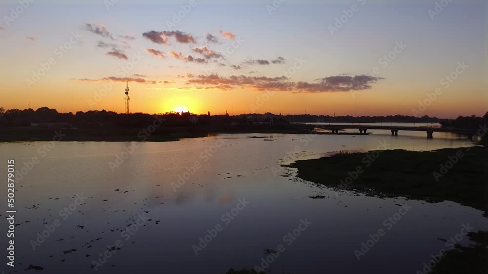 Sunset clouds and reflextions. Drone out over the ñeembucu creek in Paraguay. Sunset clouds and reflextions. Drone out over the ñeembucu creek in Paraguay.