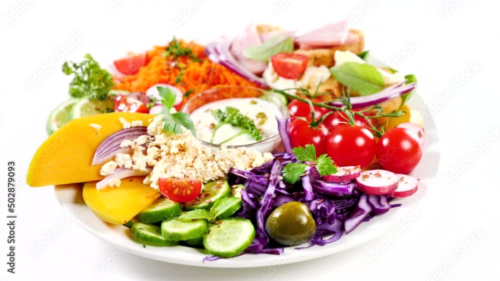 vegetable salad on plate isolated on white background