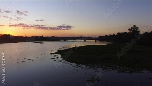 Static shoot of the ñeembucu creek and bridge at sunset photo