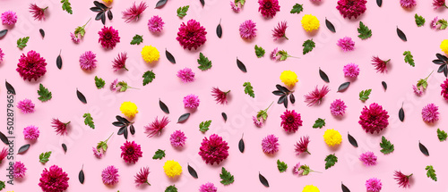 Many beautiful flowers and leaves on pink background. Pattern for design