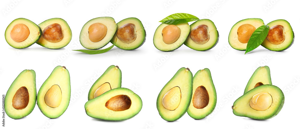 Many halves of fresh avocado isolated on white