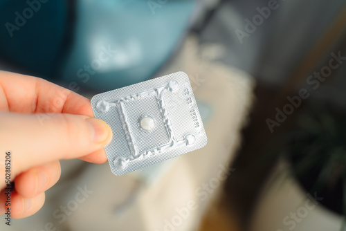 Medicine for emergency contraception in a female hand. Emergency contraceptive pill.