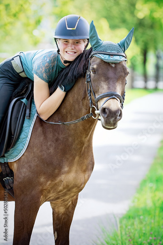 Reiterin mit Reitpony