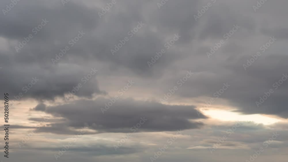 Sunset view of stormy Clouds in the sky. Time-lapse. Sunset view of stormy Clouds in the sky. Time-lapse.