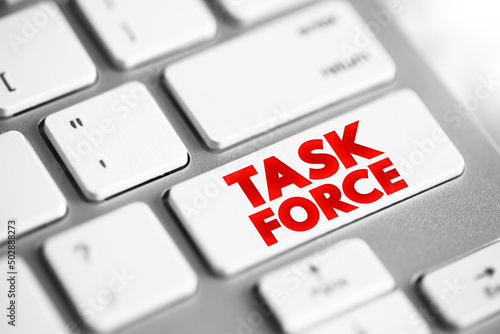 Task force - unit or formation established to work on a single defined task or activity, text button on keyboard photo