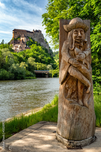 Orava castle and wooden scuplture in Slovakia photo