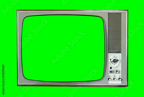 Old vintage TV with green screen for adding video isolated on green background.Vintage TVs 1960s 1970s 1980s 1990s 2000s.  photo