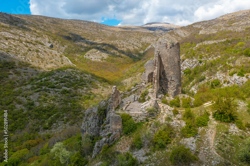 Glavas (Dinaric) fortress  on the foothill of Dinara Mountain photo