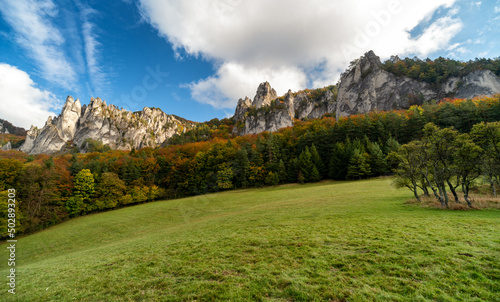 Colorful trees in autmn forest at Sulov rocks. Autumn mountain landscape in Slovakia photo