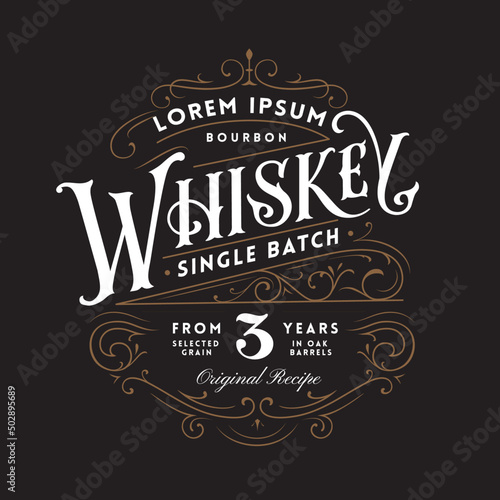 Vintage Whiskey Label Logo with Fancy Lettering and Ornate Flourished Frame.
