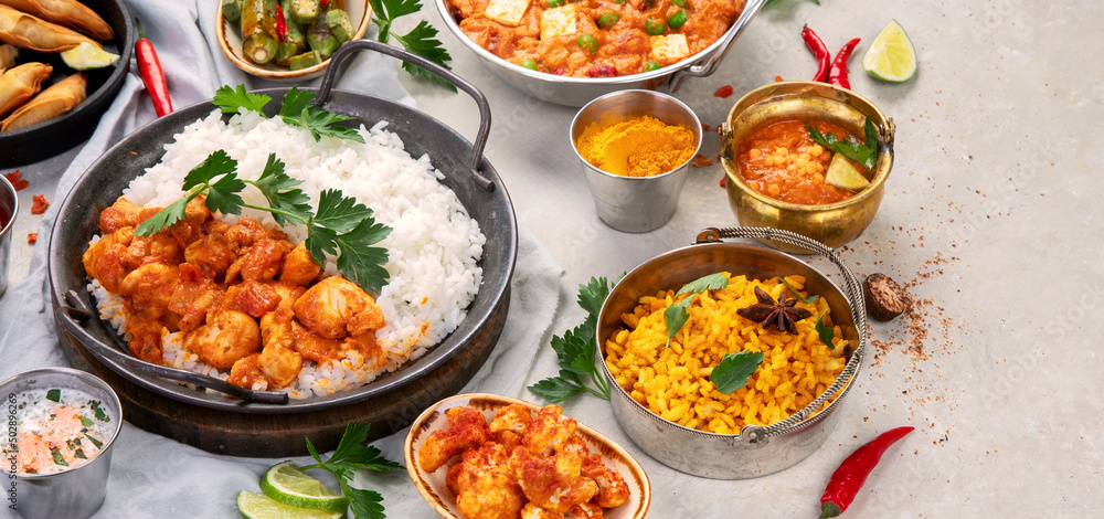 Indian food assortment on light background. Indian food assortment on light background.