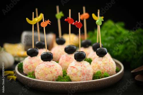 Snack balls of crab sticks. Canape.