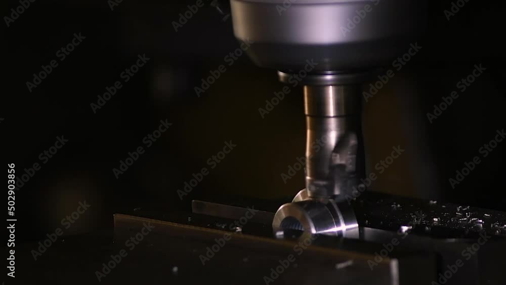 Industrial metalworking cutting automation process by milling CNC.Micro machining process , Coolant and lubrication.Close up of CNC machine at work. Industrial metalworking cutting automation process by milling CNC.Micro machining process , Coolant and lubrication.Close up of CNC machine at work.